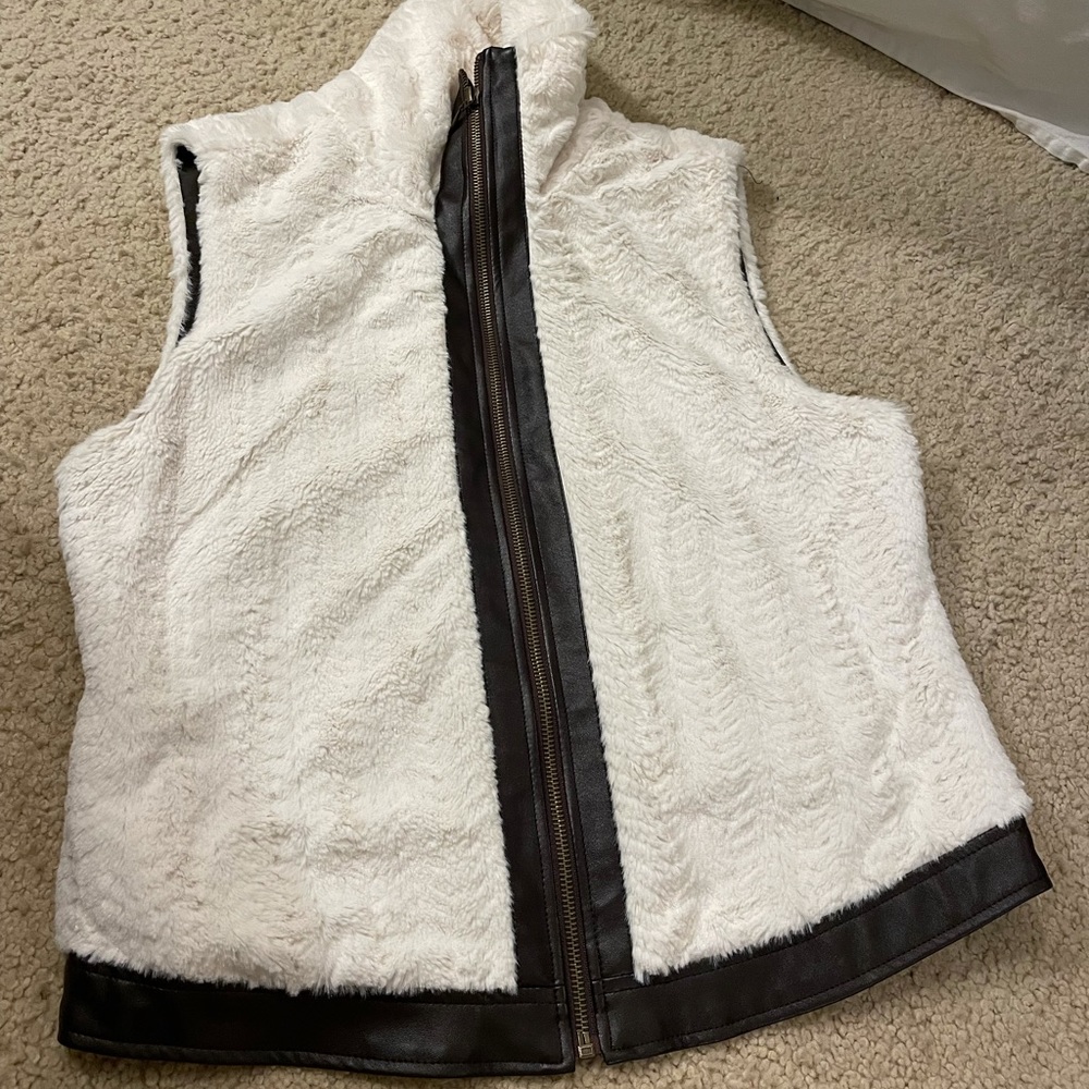 White fuzzy white and leather vest